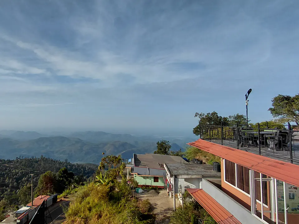 The Mist property beside green hills in Haputale.